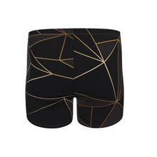 Load image into Gallery viewer, Abstract Black Polygon with Gold Line Swimming Trunks by The Photo Access